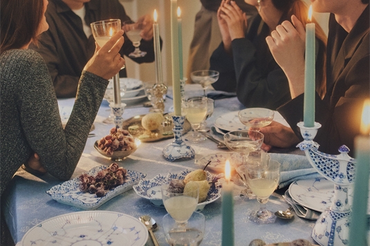 A christmas gathering with friends and a beautiful set table with all Royal Copenhagen